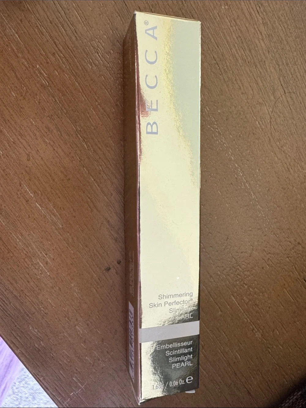 BECCA Shimmering Skin Perfector Liquid Highlighter - Gold Pearl Packaging